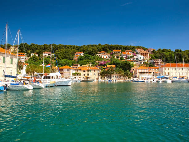 Jelsa bay on Hvar island Jelsa, Hvar island, Croatia - June 21st 2014:  Jelsa fishing town is an ideal destination for all those who are looking to benefit from the rich monumental heritage and natural beauties of Hvar island. jelsa stock pictures, royalty-free photos & images