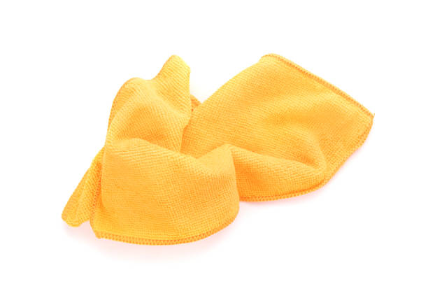 istock Orange Microfiber Cleaning Cloth Isolated on White Background 1217640876