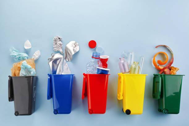 istock Garbage recycling in flat style on blue background. Garbage collection. 1217646229