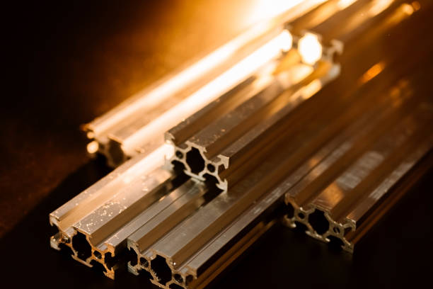 istock v slot aluminum profile lies on a black table, work surface with a bright lantern. how to assemble a cnc machine do it yourself 1217646461