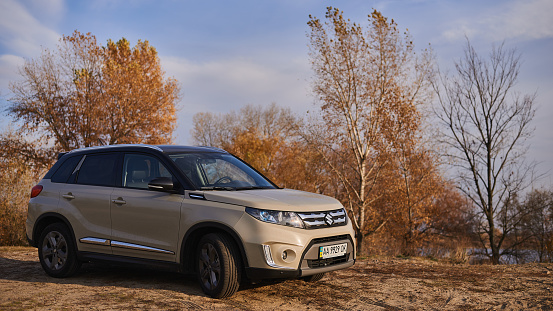 UKRAINE, KYIV - NOVEMBER 01, 2015: Compact crossover Suzuki Vitara of 2015 release year stands outside the town of Kyiv.