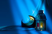 Oriental and traditional set of lantern, crescent with moon light effects.