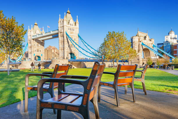 istock Park chairs at Tower Bridge London England 1217652938