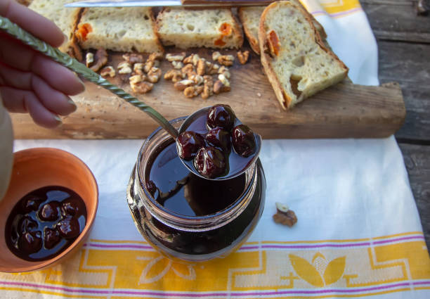 istock sourdough homemade bread. With nuts and dried apricots. Cherry jam 1217653482
