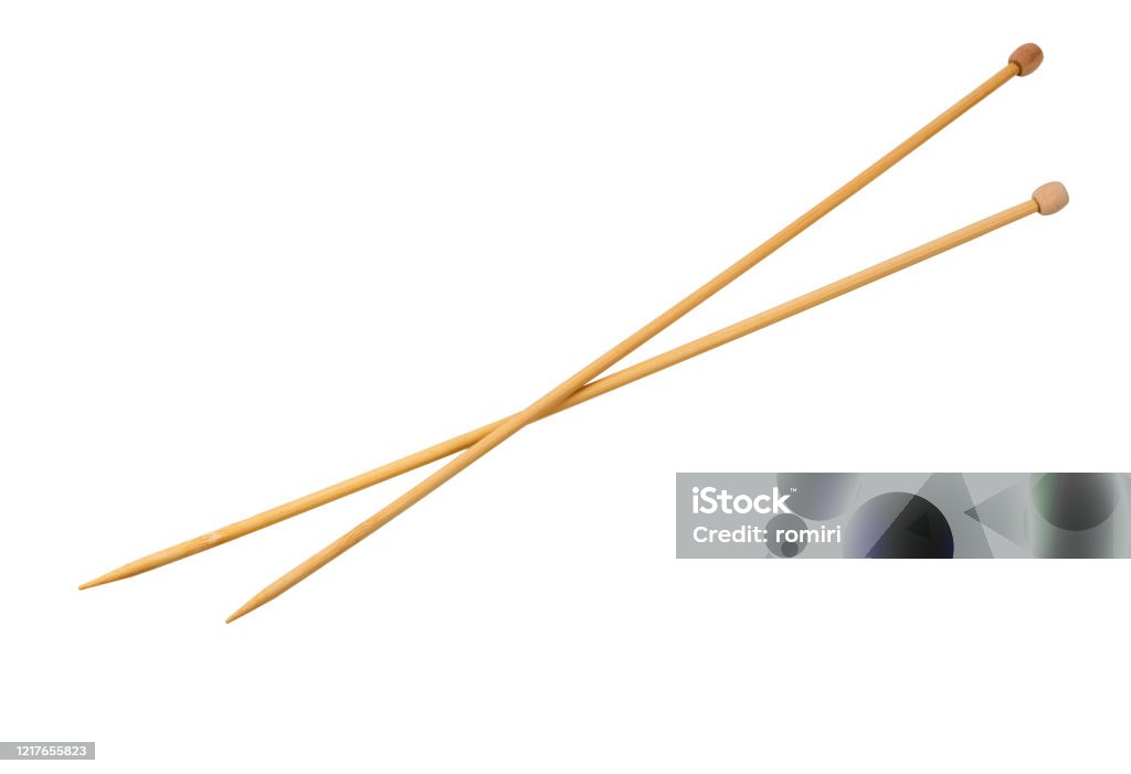 Knitting needles isolated on a white Knitting needles isolated on a white background. Pair of wooden knitting needles. Knitting Needle Stock Photo