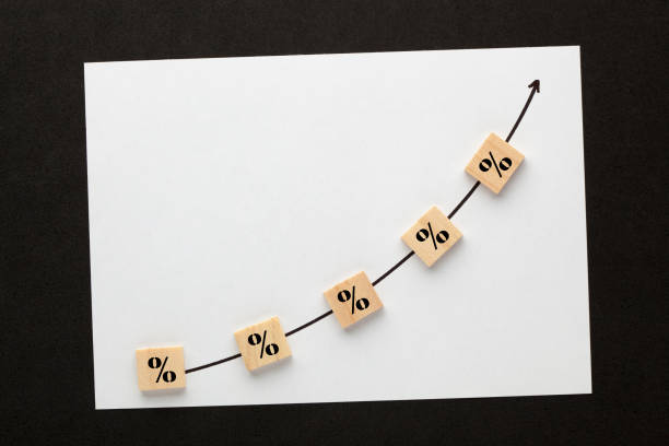 istock Percentage symbol with directional arrow 1217658939