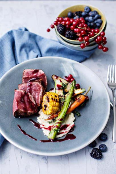 istock Steak with berry sauce 1217661413