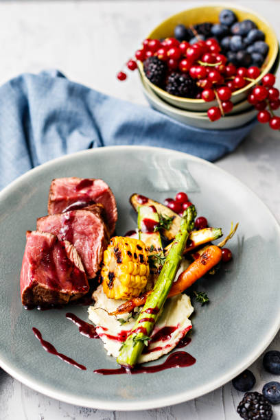 istock Steak with berry sauce 1217661431
