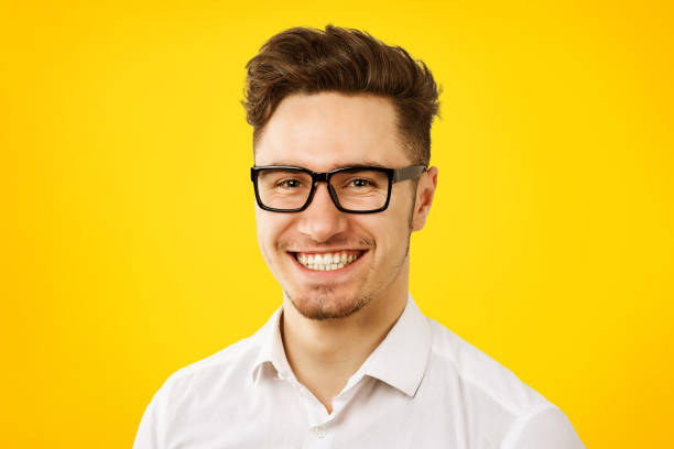 istock Funny young man wearing white shirt and glasses 1217672729