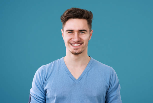 istock Casual handsome man in blue sweater 1217672783