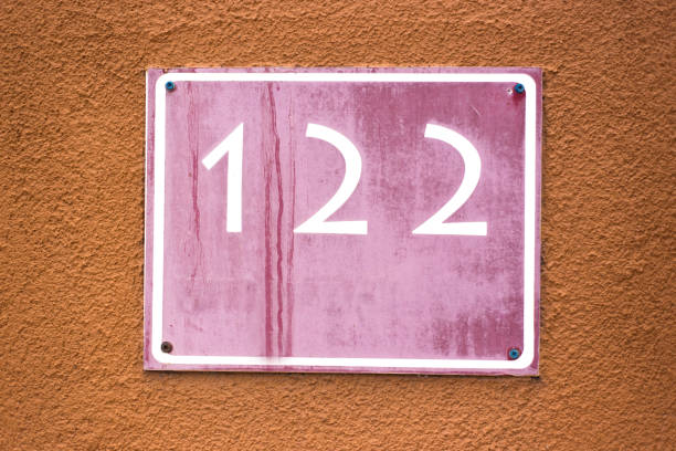 istock Number 122 Street Address; Brown Wall 1217672866