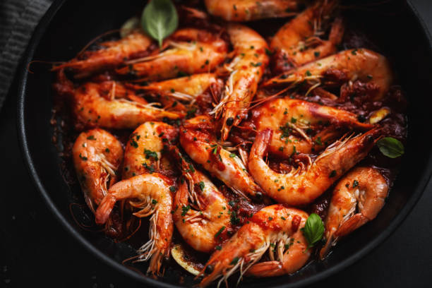 istock Fried shrimps with spices on pan 1217677659
