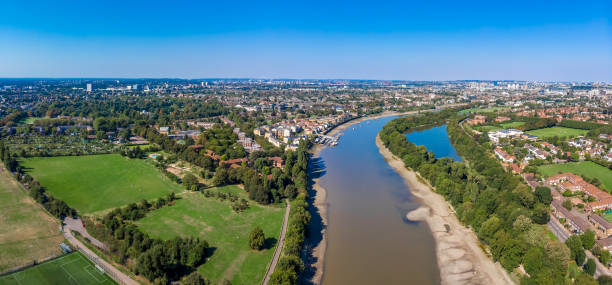 Aerial view of Chiswick and river Thames in summer, London Aerial view of Chiswick and river Thames in summer, London chiswick stock pictures, royalty-free photos & images