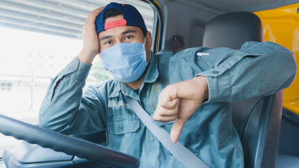 istock Truck driver wearing a mask 1217680271
