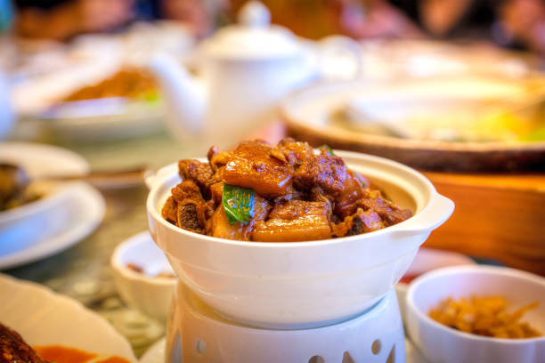 Famous Chinese cuisine red braised pork belly cooked with  aromatic spices and dark soy sauce.