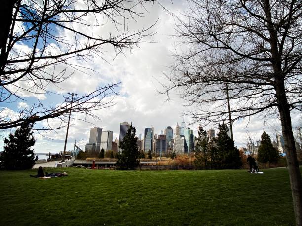 istock Social Distancing in a Park in New York 1217686476