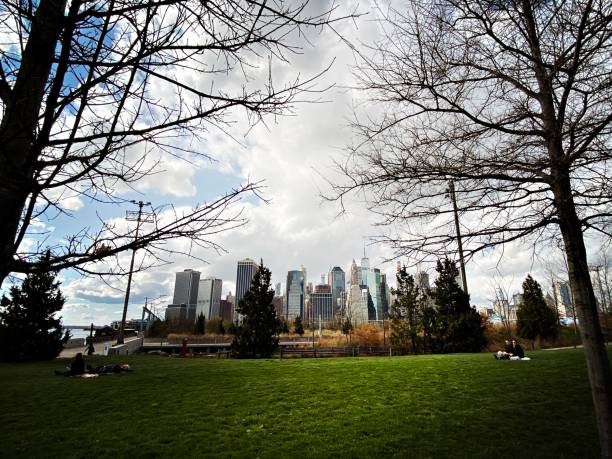 istock Social Distancing in a Park in New York 1217686483