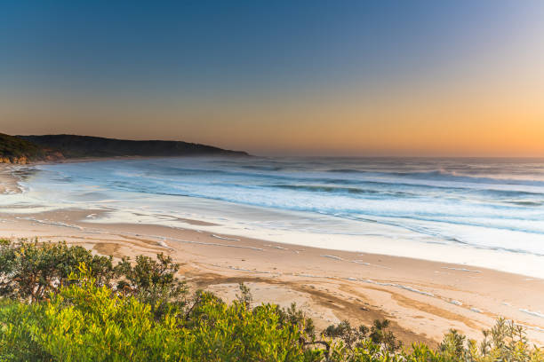 istock Sunrise Seascape, Sea Foam and Beach 1217687408