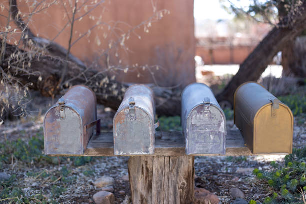 istock Line of Classic Old Rural US Mailboxes 1217688336