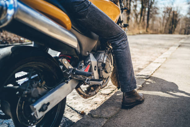 istock Man sitting on his motorcycle 1217690091