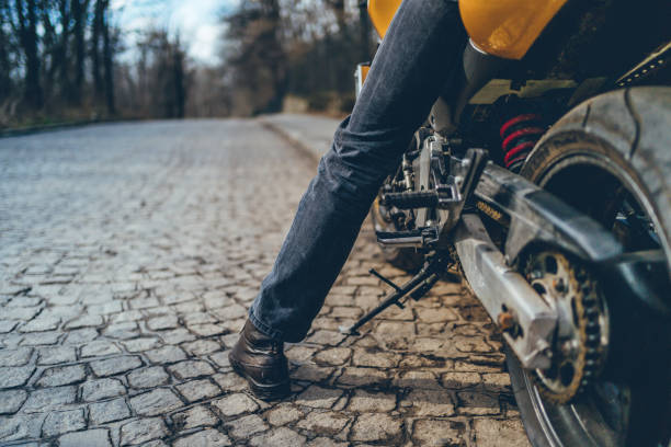 istock Man sitting on his motorcycle 1217690112