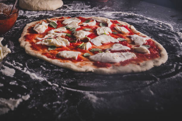 istock Making an Italian pizza at home 1217691702