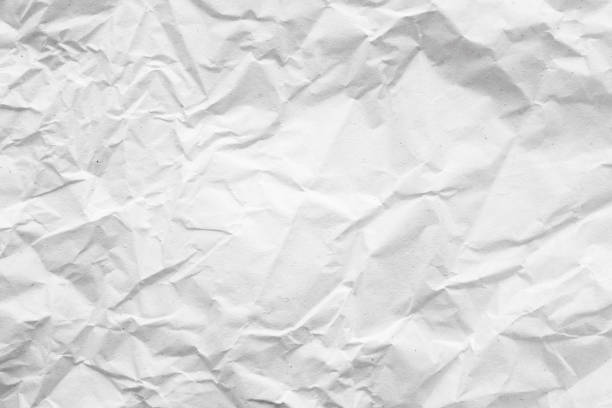 istock White crumpled paper abstract background texture 1217691839