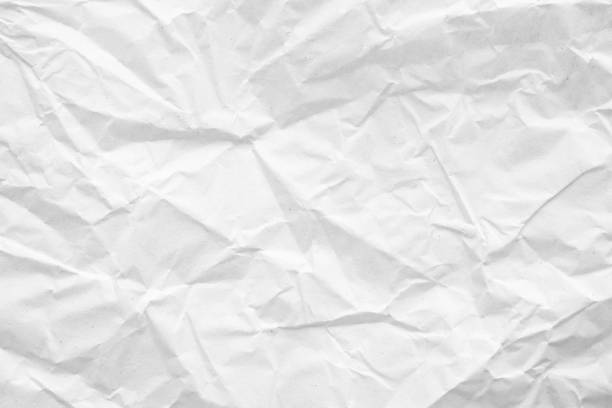istock White crumpled paper abstract background texture 1217691841
