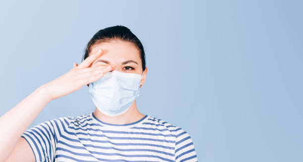 istock girl touches face 1217691941