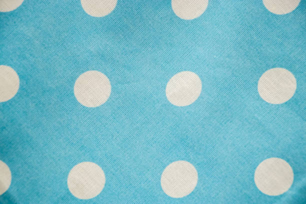 istock Blue cotton fabric with white polka dots. 1217698647