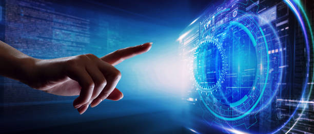 istock Business, technology, internet and networking concept. Young businessman working in the office, select the icon on the virtual display. 1217701176