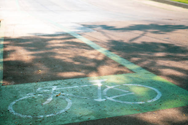 istock Bicycle icon signage on bike lane. 1217706129