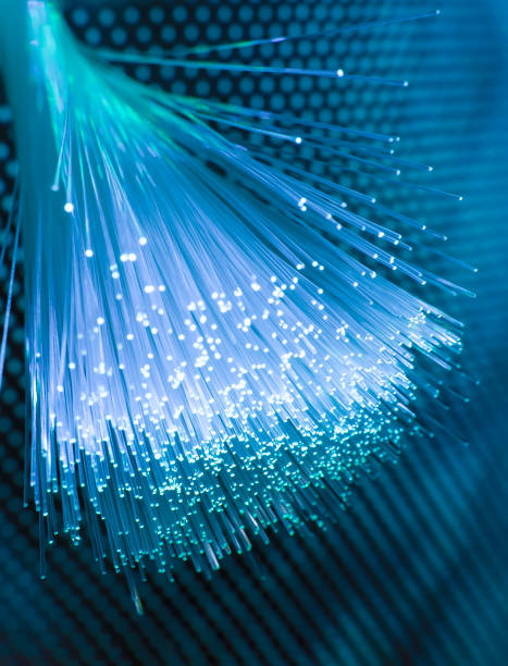 Fiber optical cables fiber optics network cable for ultra fast internet communications, thin light threads that move information at high speed. computer cable photos stock pictures, royalty-free photos & images