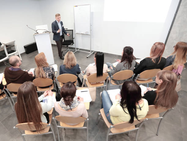 istock rear view.the project Manager conducts a meeting 1217707790