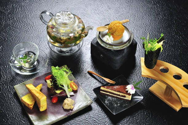 istock Various food served in the plate on the black table 1217708111