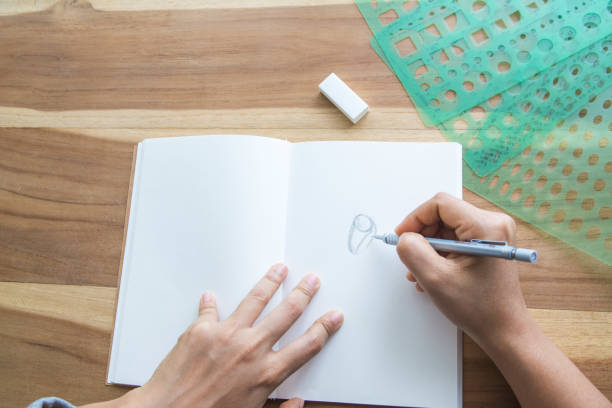 istock Jewelry designer is drawing sketch works 1217709052