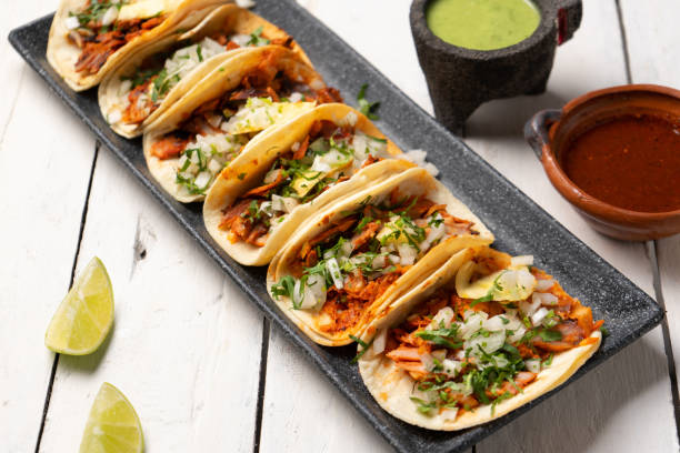 Tacos Al Pastor - Banco de fotos e imágenes de stock - iStock Tacos Al Pastor - Banco de fotos e imágenes de stock - iStock