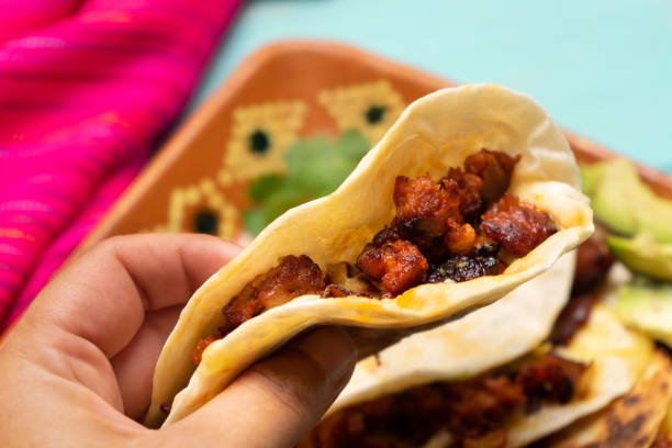 istock Mexican quesadillas with chorizo on turquoise background 1217711446