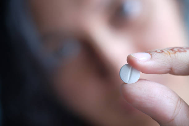 istock Close-up shot of pill in nurse's hand 1217711535