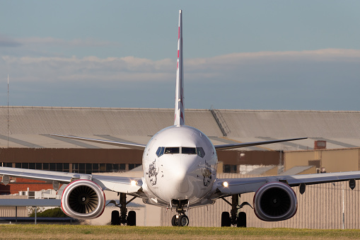 Melbourne, Australia - June 23, 2015: Virgin Australia Airlines 100th Boeing 737 VH-YFR named Scamander Beach preparing for takeoff from Melbourne Airport.