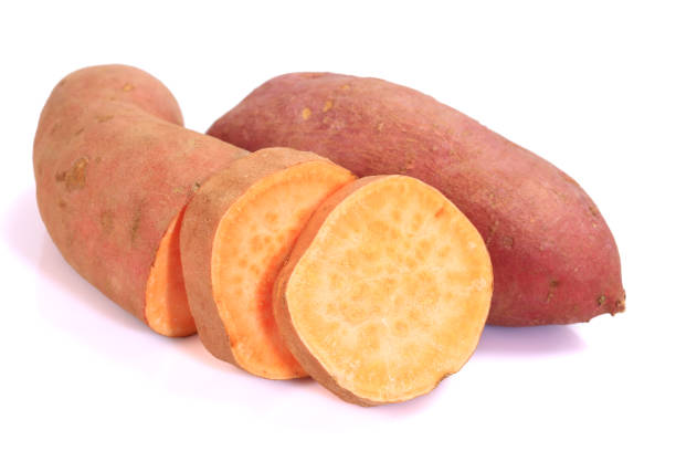 istock Sweet potato with slices   isolated on white background 1217717336