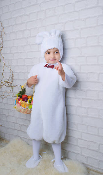 istock little boy in a white Easter Bunny costume 1217724347