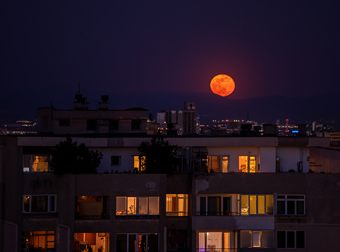 Super pink moon rising above Sofia city, Bulgaria on April 8th 2020