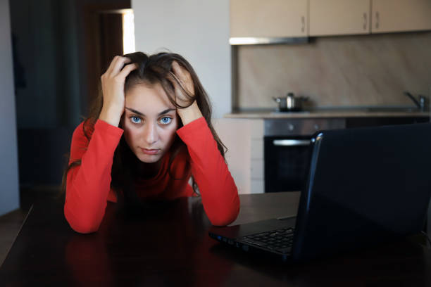 istock Tired woman working from home 1217727379