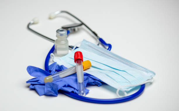 istock Blood Tubes on Gloves, Surgical Mask, Stethoscope 1217727457