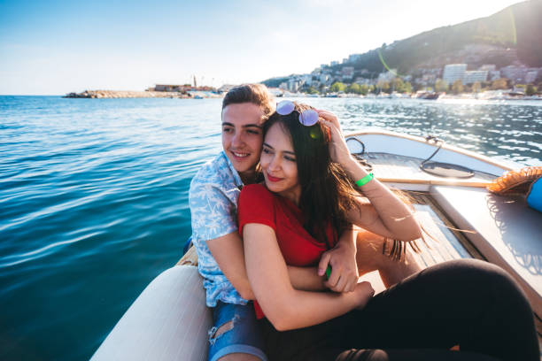 istock Young couple on boat 1217730351