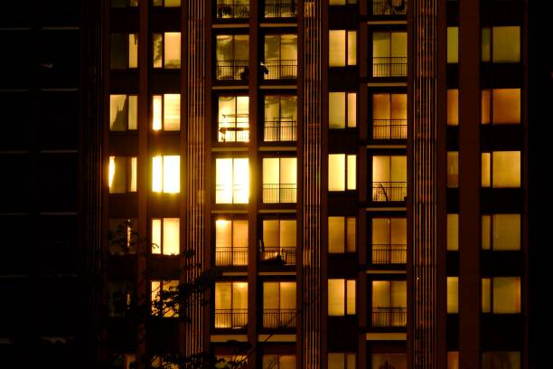 istock Silhouette sunset reflection on a city hight building glass at dusk 1217731311