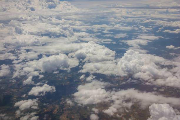 istock Blue sky with clouds background on the airplane 1217733825
