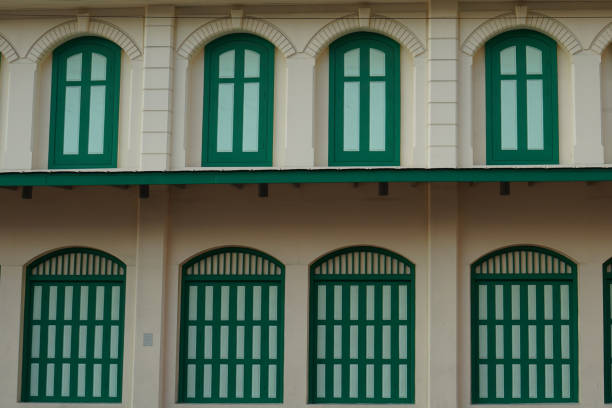 istock Vintage doors and windows, with green and yellow tones. 1217735437