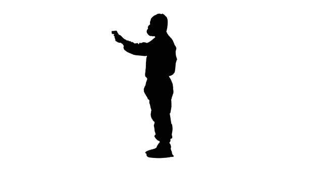 istock Silhouette Doctor wearing protective clothes using infrared fore 1217740682
